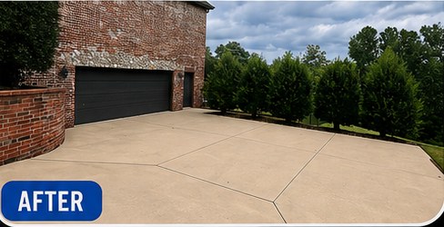 The same driveway after hot-water surface cleaning: pale, even concrete