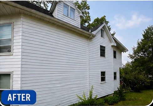 The same siding after a soft wash: white and even